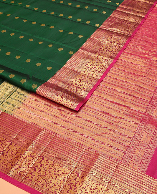 Green Vasundhara Lite Silk Mix Saree Decorated with Zari Buttas, Featuring a Contrast Border of Kathir, Muthu, Greek Key, and Kodi Visiry Designs, Pallu Elevated with Geometric Patterns, and a Contrast Blouse