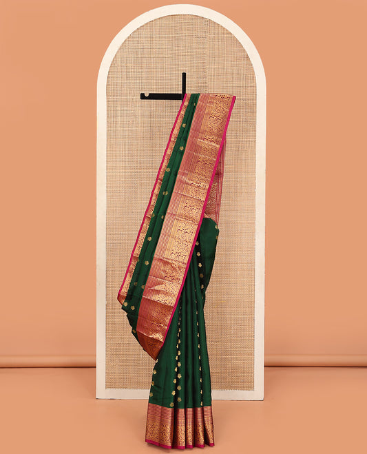 Green Vasundhara Lite Silk Mix Saree Decorated with Zari Buttas, Featuring a Contrast Border of Kathir, Muthu, Greek Key, and Kodi Visiry Designs, Pallu Elevated with Geometric Patterns, and a Contrast Blouse