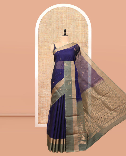 Blue Silk Cotton Saree, Bedecked with Zari Buttas, a Contrast Leaf Motif Border, Geometric Pallu, and a Contrast Blouse