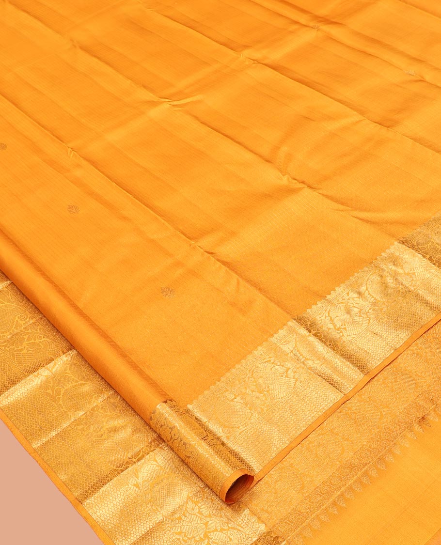 Yellow Kanchipuram Silk Saree, Sparsely Woven with Zari Buttas and Muthu Stripes, a Zari Border of Thilakam Mokku, Muthu, Iruthalai Pakshi, Manga, and Mayil Kann, Jaal Pallu, Matching Blouse
