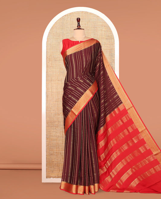 Brown Mysore Silk Saree, Spotlighted By Geometric Zari Designs All Over Its Body, Complemented by Captivating Contrast Border of Traditional Zari Designs, Gleaming Zari Striped Pallu, and Paired with a Contrast Blouse