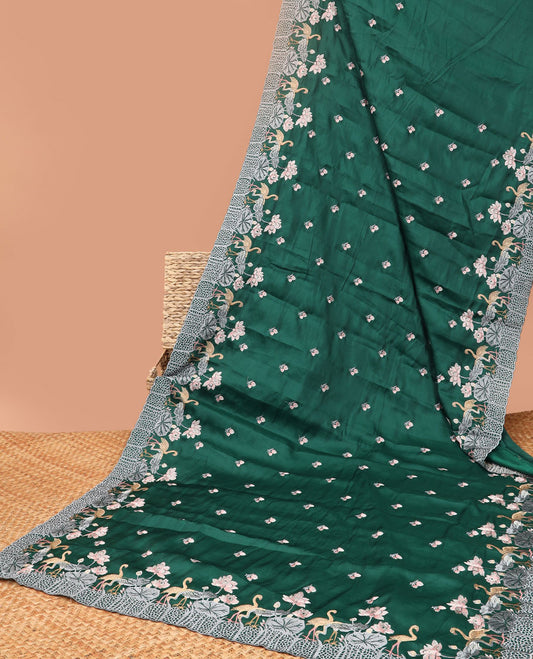 Green all-over floral motifs thread embroidery tussar silk saree with self floral, animal embroidery border