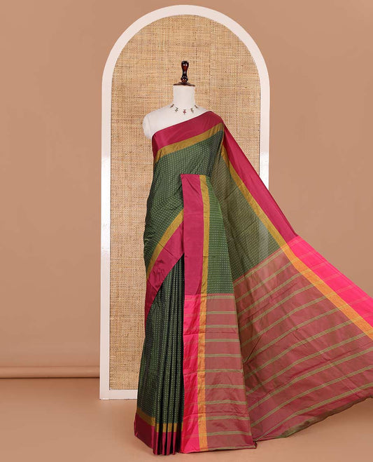 Olive green-pink plus-shaped buttas steeped semi-soft silk saree, contrast satin border of stripes, striped pallu, and contrast blouse