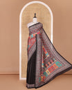 Black kaleidoscopic colored floral-geometric printed with mirrorwork masakali saree, printed border, print with mirror work pallu, and a matching blouse