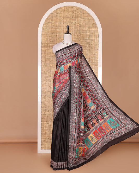 Black kaleidoscopic colored floral-geometric printed with mirrorwork masakali saree, printed border, print with mirror work pallu, and a matching blouse