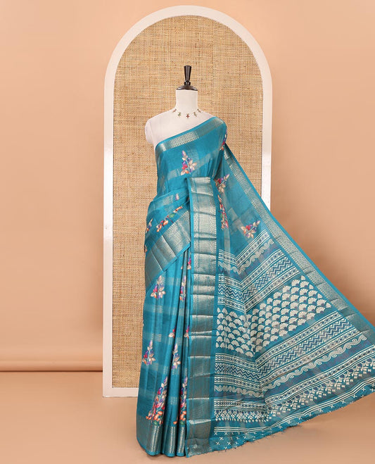 Blue zari striped & floral digital printed fancy tussar silk saree traditional zari border, geometric printed pallu & discharge printed blouse