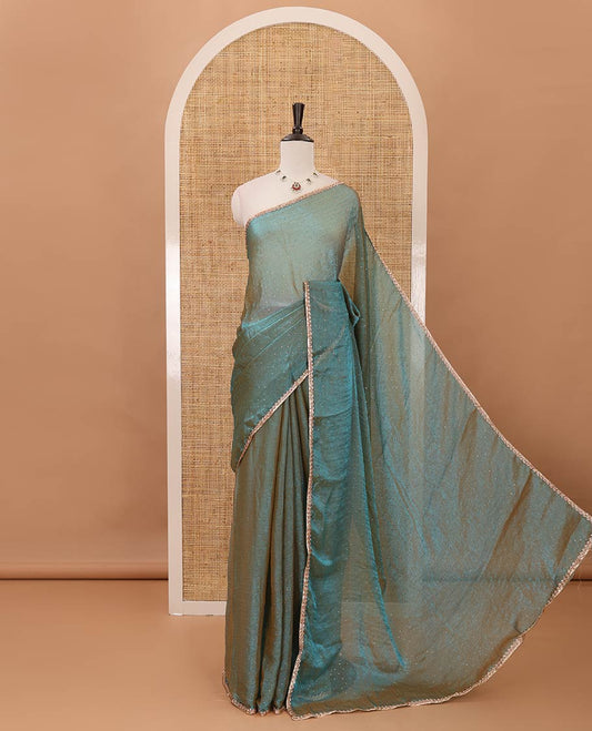 Peacock green Swarovski stone work embedded fendy-chiffon saree, scallop lace border & floral mixed embroidered blouse