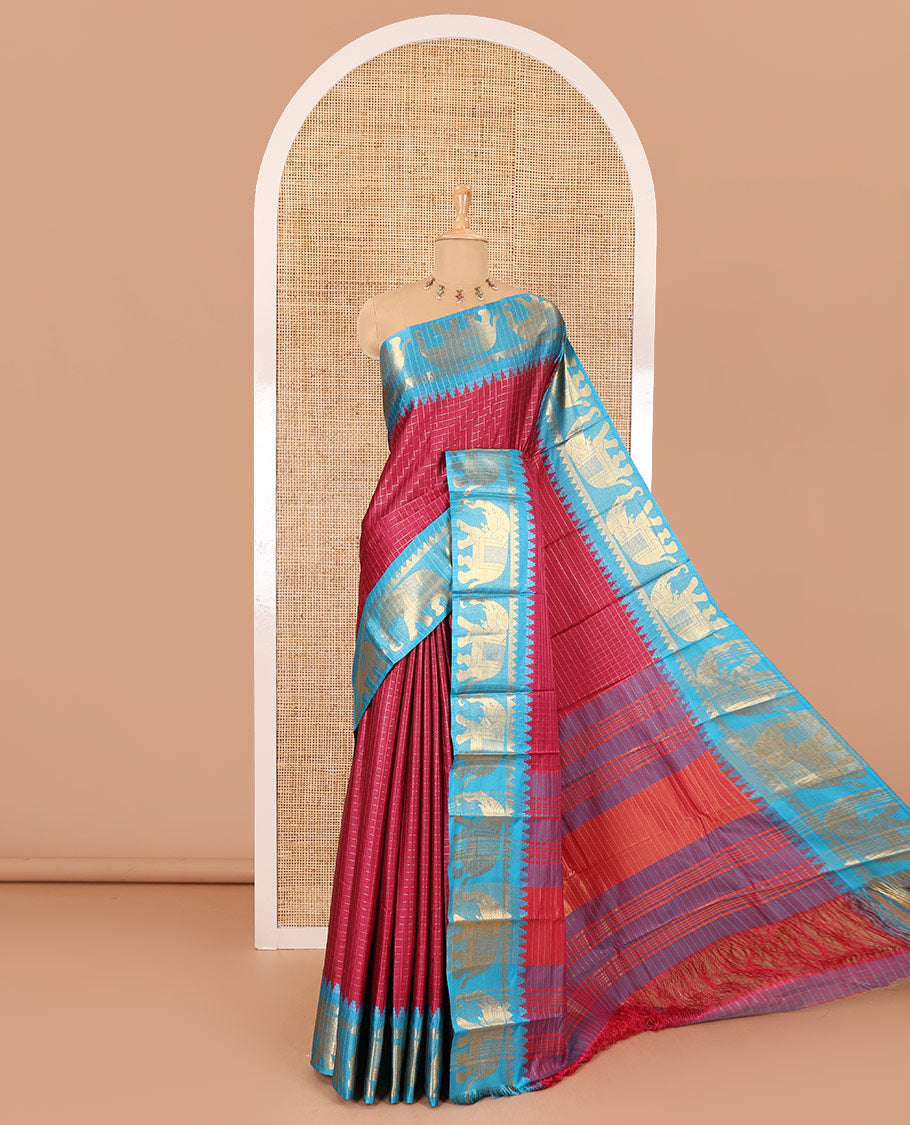 Purple zari checked semi-taffeta saree, contrast satin temple border of elephant motifs, striped pallu, and a contrast striped blouse