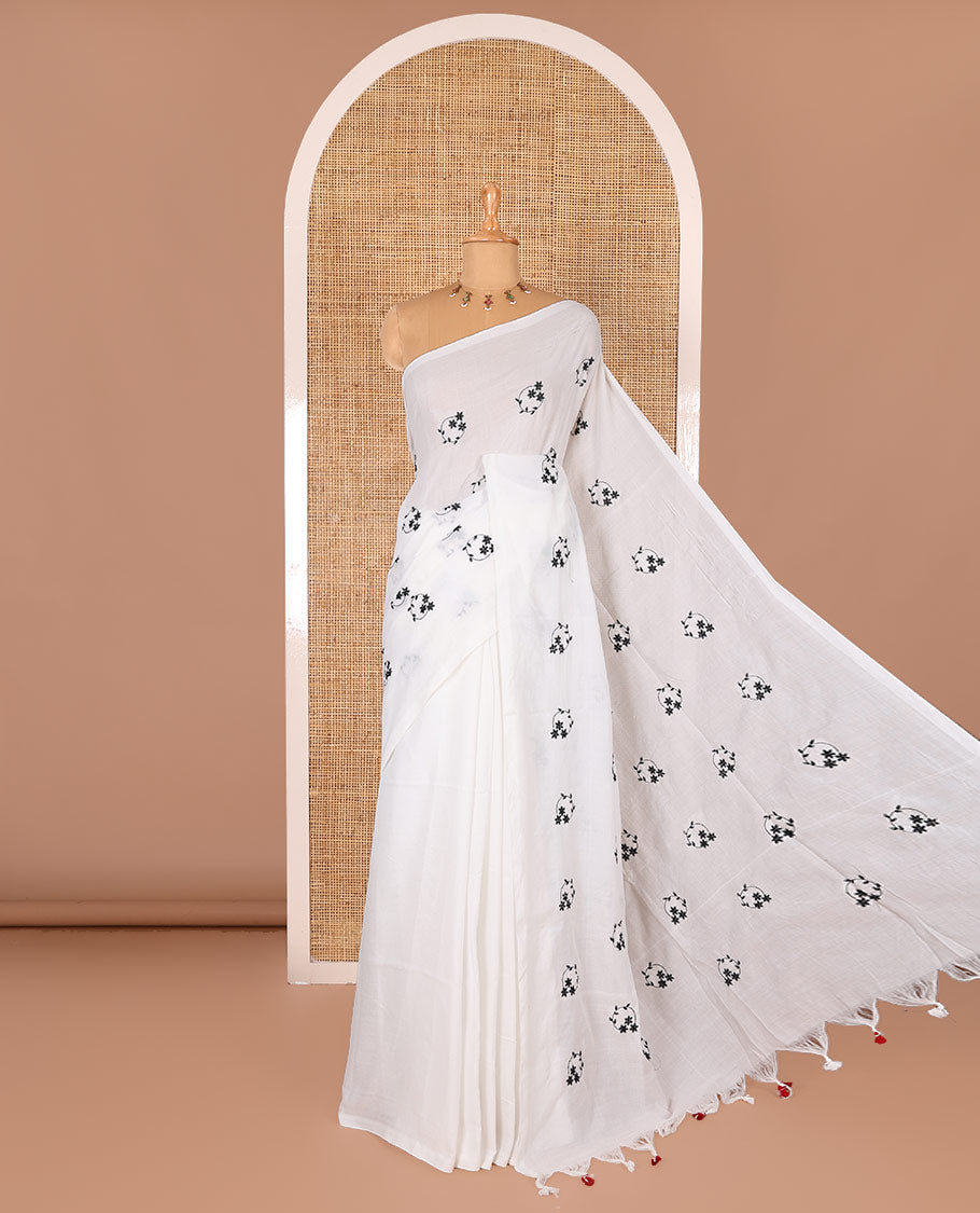 Borderless white and black floral motifs embroidered Khadi mul cotton saree with a matching plain blouse