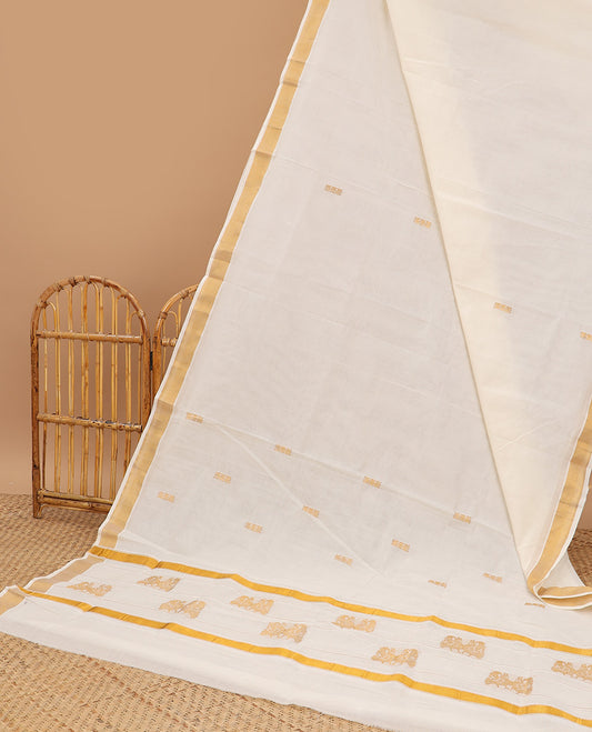 Cream kerala saree, zari border & pallu of peacock zari designs