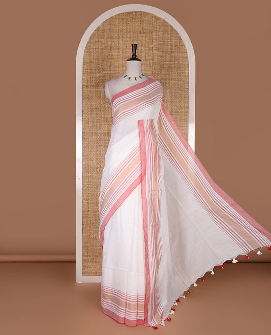 Cream-pink plain design mul mul cotton saree, contrast copper zari horizontally striped border, plain pallu, and plain blouse