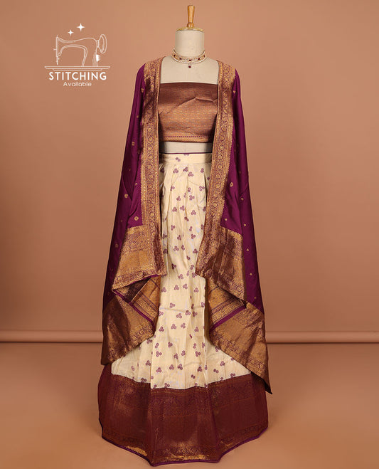 Cream floral buttas half saree with contrast zari border, zari design blouse & maroon floral zari design dhavani