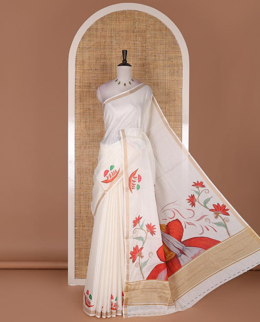 Half-white boat motifs printed Kerala cotton saree, zari border, pallu of kathakali print, and a matching blouse