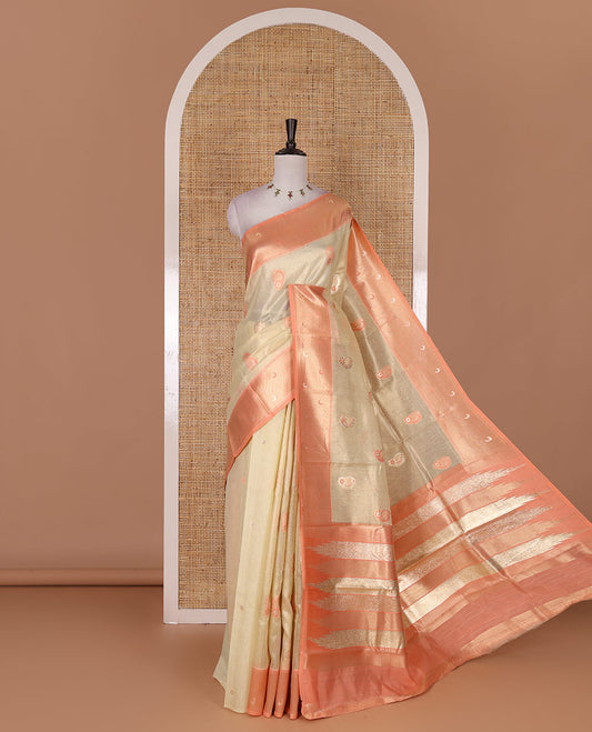Sandal antique buttas tissue silk saree, contrast satin zari border of half-moon motifs, pallu of temple design pallu, and contrast butta blouse