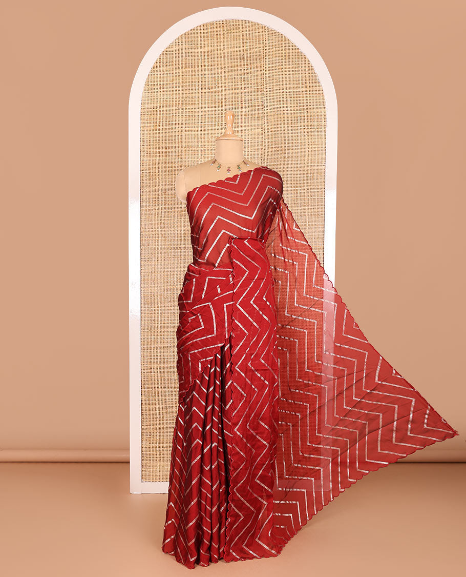 Borderless maroon zig-zag stripes gold foil printed, scallop-edged rangoli chiffon saree with a matching bandhani dotted blouse