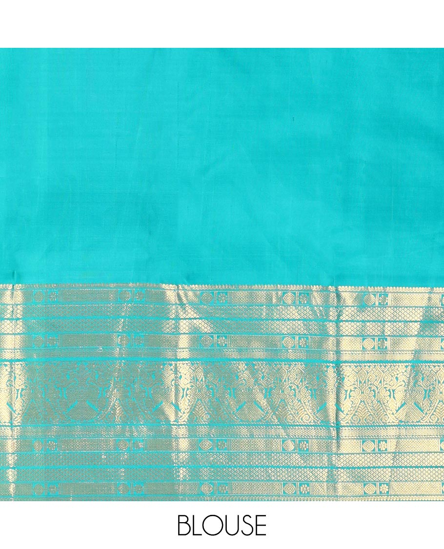 Blue Kanchipuram Wedding Silk Saree, Finely Crafted with Jacquard Design on Its Body, Highlighted by Zari Border of Mayil Kann, Rudraksham, Kamalam, and Iruthalai Pakshi Designs, Intricately Designed Pallu, and Paired with a Matching Blouse