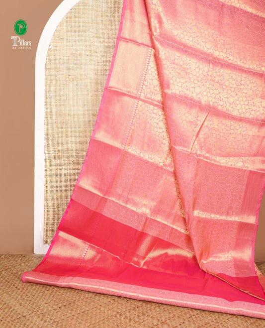Baby pink floral design tissue saree with zari border & rich pallu along with contrast blouse