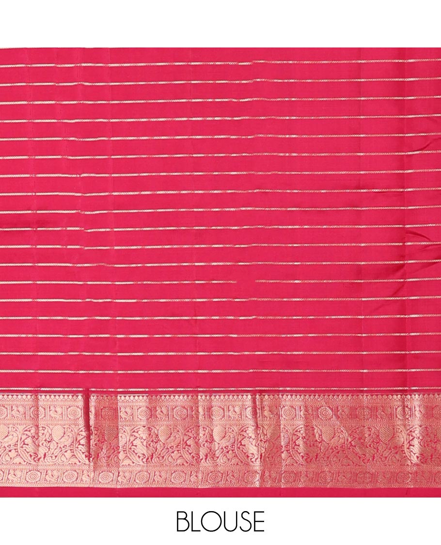 Brown checked silk saree with self border of thilakam mokku, poo chakram , mayil , manga designs & intricate zari pallu