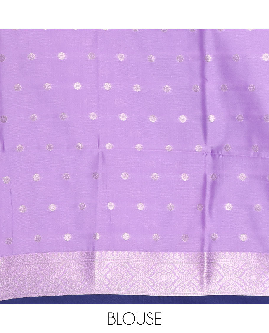 Navy blue-lavender floral buttas elite soft silk saree, contrast floral buttas border, and pallu of Mughal-style intricate zari designs