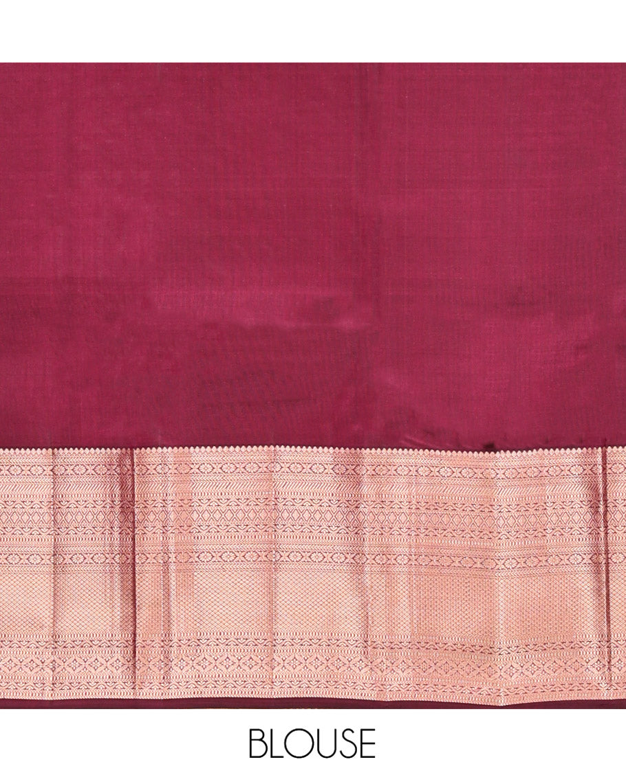 Maroon Kanchipuram Wedding Silk Saree, Elegantly Embellished with Jacquard Design on Its Body, Highlighted by Zari Border of Thilakam Mokku, Kathir, Cross Kamalam, and Mayil Kann Designs, Grand Jaal Pallu, and Paired with a Matching Blouse