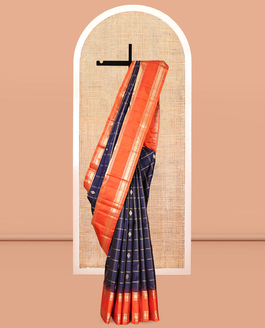 Blue Kanchipuram Silk Saree, Gleamed Up with Butta Enclosed Checks, Complemented by a Contrast Rettai Pettu Zari Border, Grand Pallu, and a Contrast Blouse