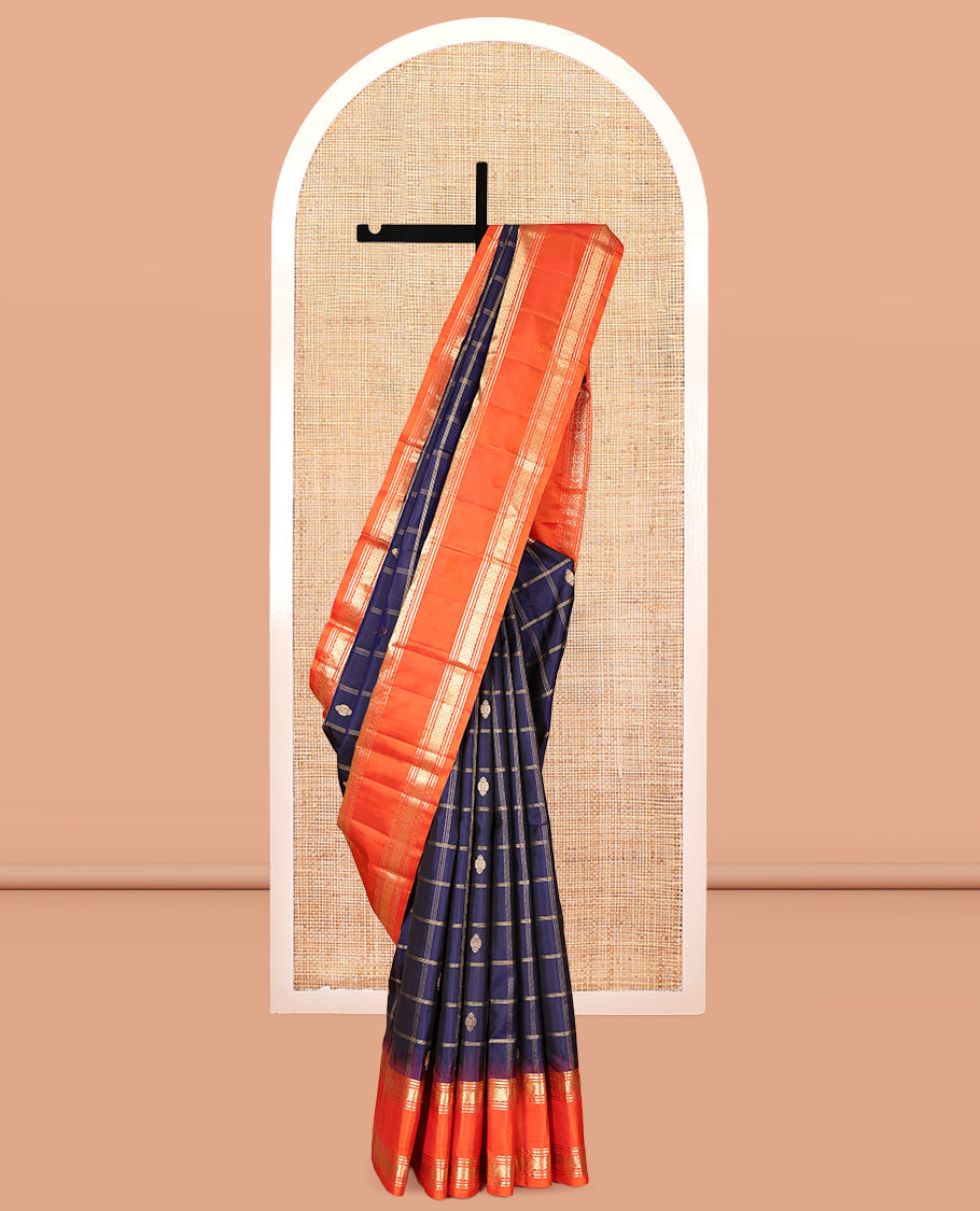 Blue Kanchipuram Silk Saree, Gleamed Up with Butta Enclosed Checks, Complemented by a Contrast Rettai Pettu Zari Border, Grand Pallu, and a Contrast Blouse