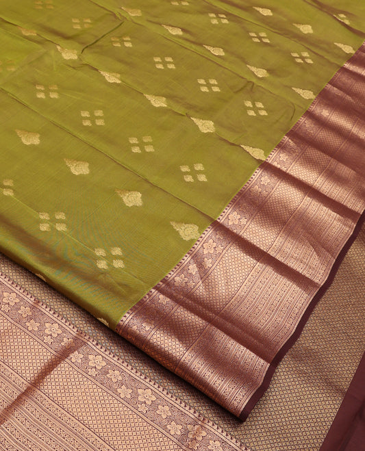 Green Vasundhara Lite Silk Mix Saree, Elegantly Framed with Zari Buttas All Over Its Body, Complemented by Contrast Border of Manga, Floral, Jaal, and Kodi Visiry Designs, Grand Jaal Pallu and Paired with a Contrast Blouse