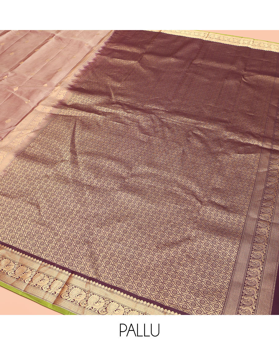 Rose Gold Pink Kanchipuram Silk Saree, Prettified with Zari Buttas All Over Its Body, Complemented by a Contrast Border of Mutthu, Mayil Kann, and Mayil Designs, Grandly Jaal Design Decked Up Pallu, and Paired with a Contrast Blouse
