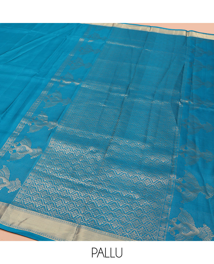 Blue Plain Vasundhara Silk Saree, Highlighted by Zari Border of Iruthalai Pakshi and Traditional Designs, Grand Jaal-Patterned Pallu, and Paired with a Matching Blouse