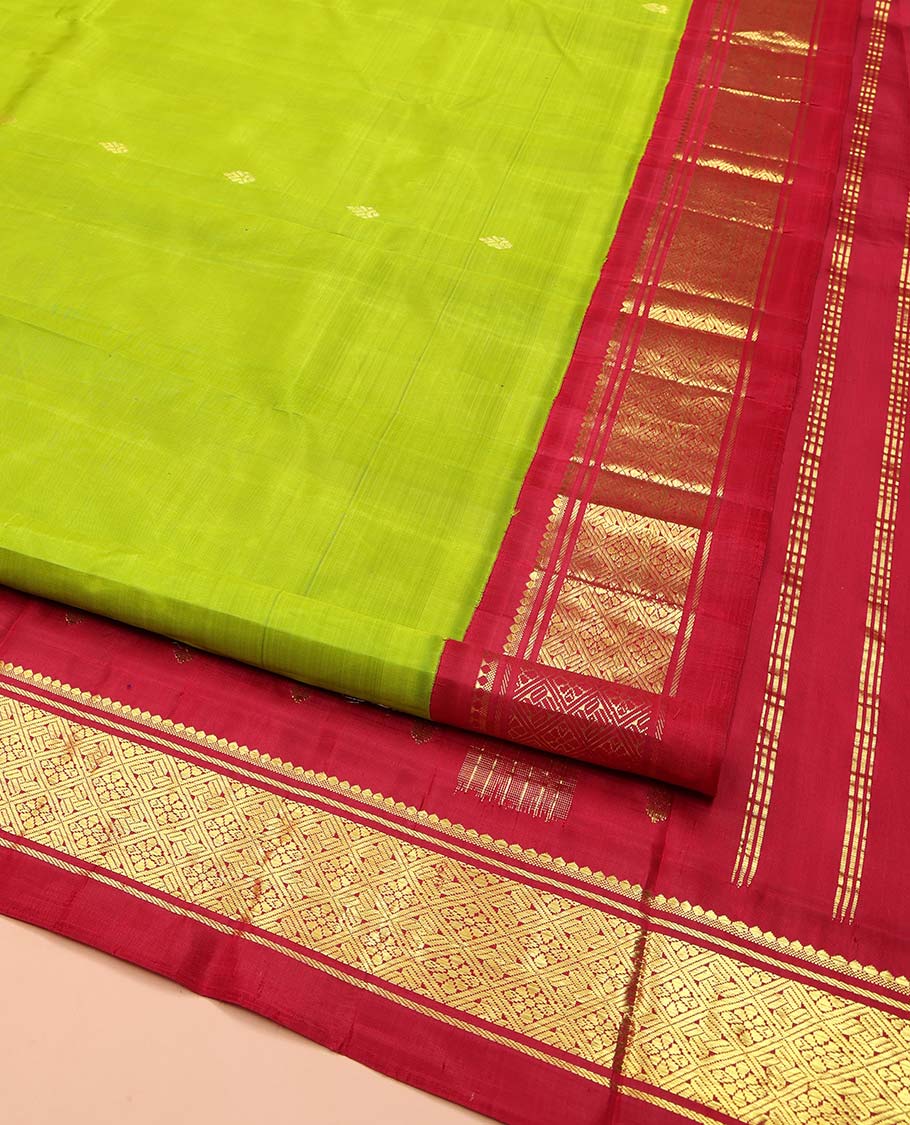 Green Kanchipuram Silk Saree, Beautified with Zari Buttas on Its Body, Complemented by a Contrast One-Sided Korvai Border of Banaras, and Jaal Designs, Pallu of Zari Designs, and Comes Without a Blouse