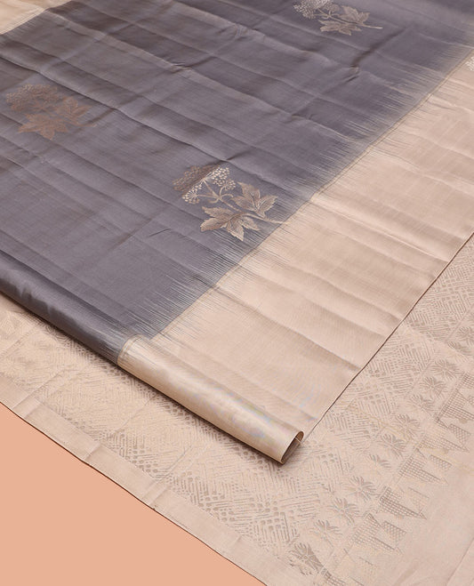Grey Mayuri Soft Silk Saree, Elevated with Zari Buttas All Over Its Body, Complemented by Contrast Border, Intricately Designed Pallu, and Paired with a Contrast Blouse