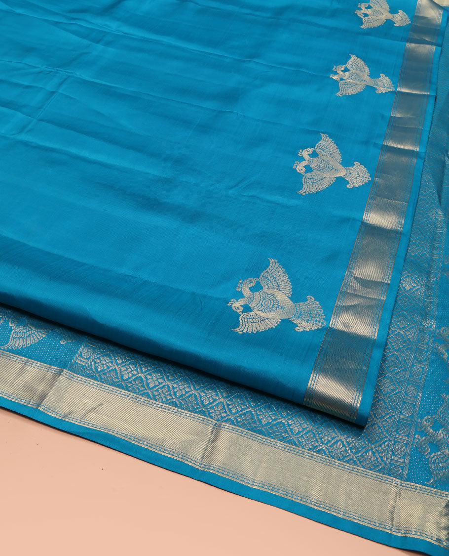 Blue Plain Vasundhara Silk Saree, Highlighted by Zari Border of Iruthalai Pakshi and Traditional Designs, Grand Jaal-Patterned Pallu, and Paired with a Matching Blouse