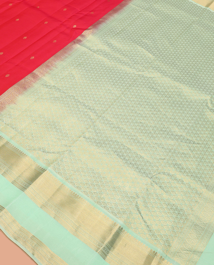 Red zari buttas Vasundhara silk mix saree, contrast border of thilakam, kathir, mayil kann, kathir, kamalam, and banaras, and peacock feather motifs pallu