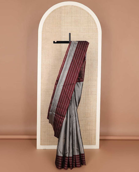Grey zari buttas silk mix saree, contrast striped border & pallu of floral designs
