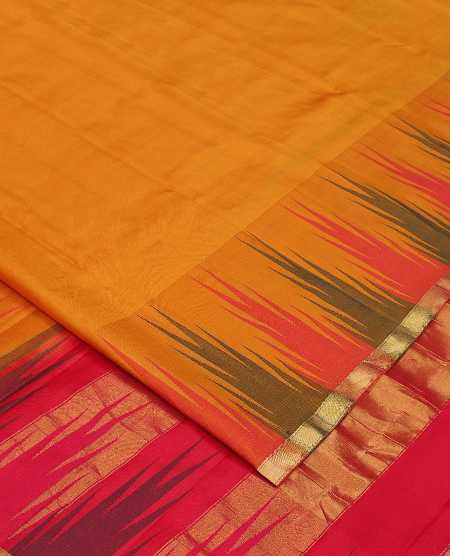 Orange plain Bangalore silk saree, contrast temple zari piping border, and temple design pallu