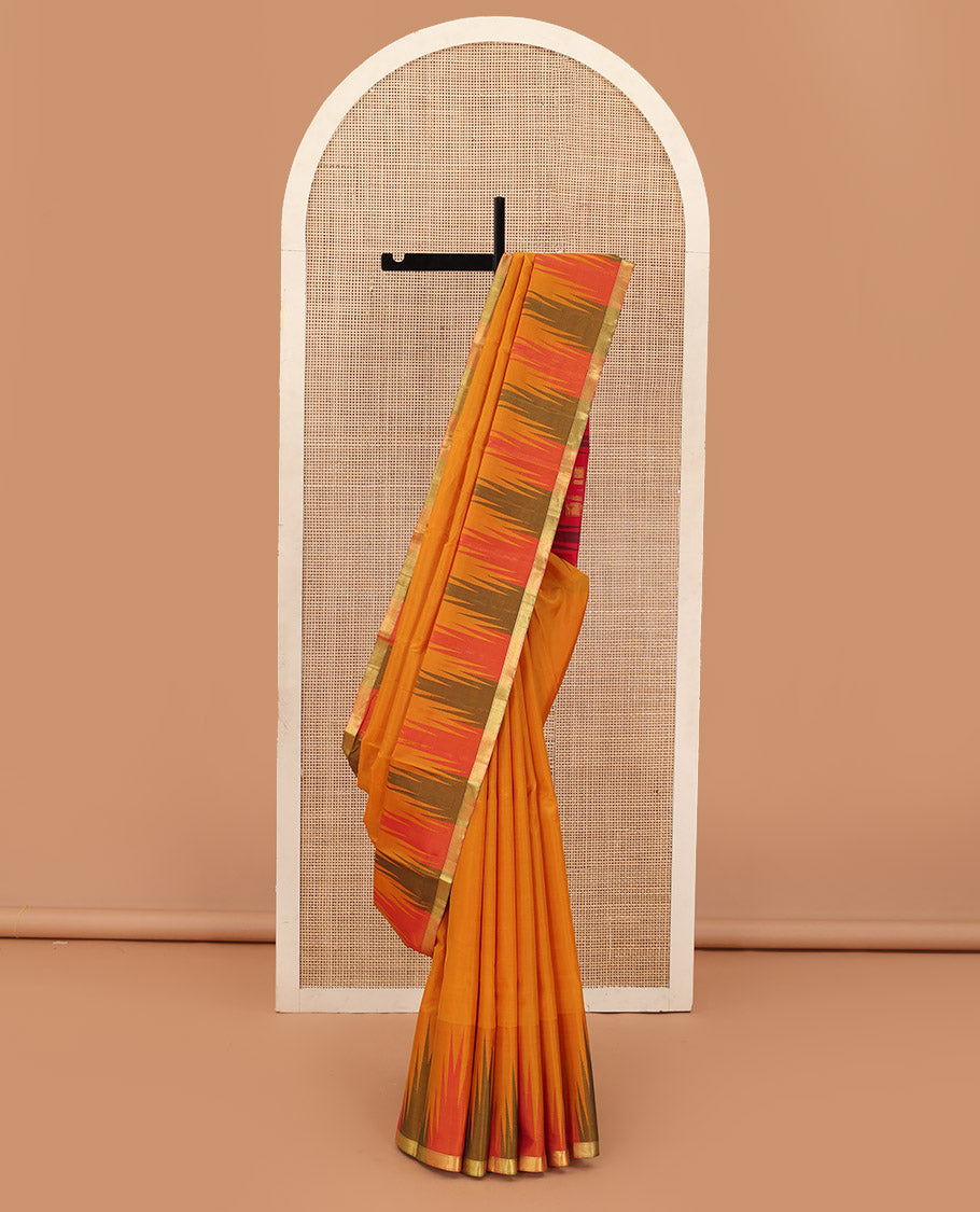 Orange plain Bangalore silk saree, contrast temple zari piping border, and temple design pallu