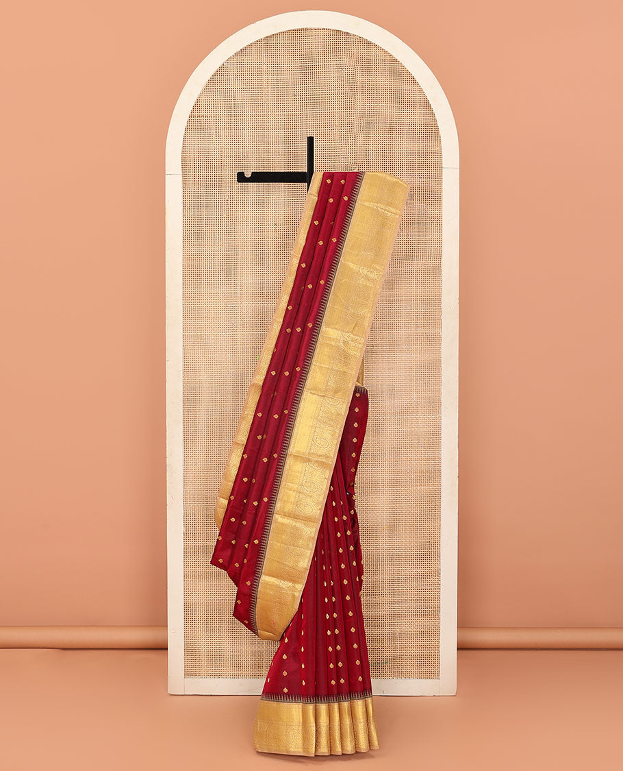 Maroon buttas Bangalore silk saree, contrast temple traditional zari border, and pallu of jaal designs