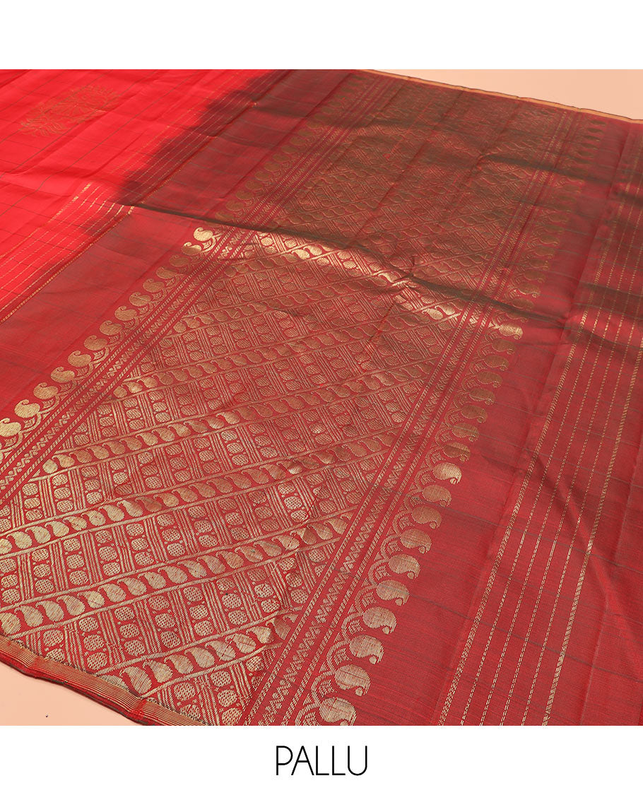 Red Kanchipuram Silk Saree Embellished with Big Floral Buttas within Checks, Complemented by a Piping Border, Featuring a Contrast Pallu Steeped with Manga Motifs, Paired with a Matching Blouse