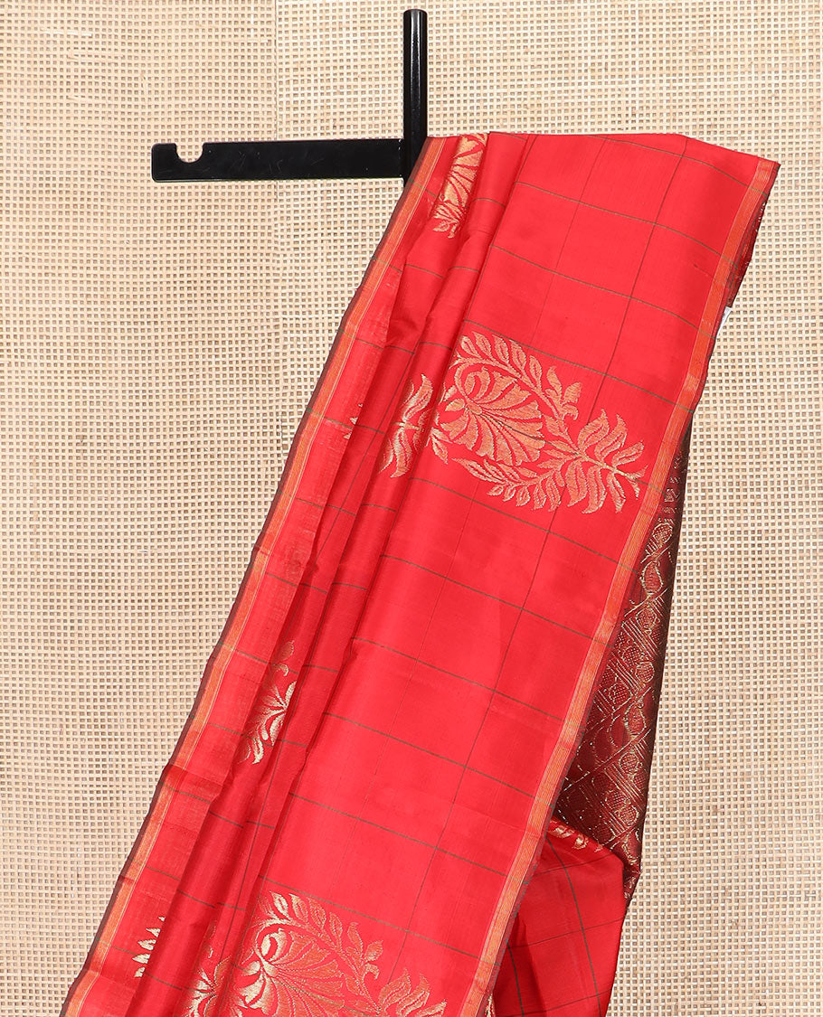 Red Kanchipuram Silk Saree Embellished with Big Floral Buttas within Checks, Complemented by a Piping Border, Featuring a Contrast Pallu Steeped with Manga Motifs, Paired with a Matching Blouse