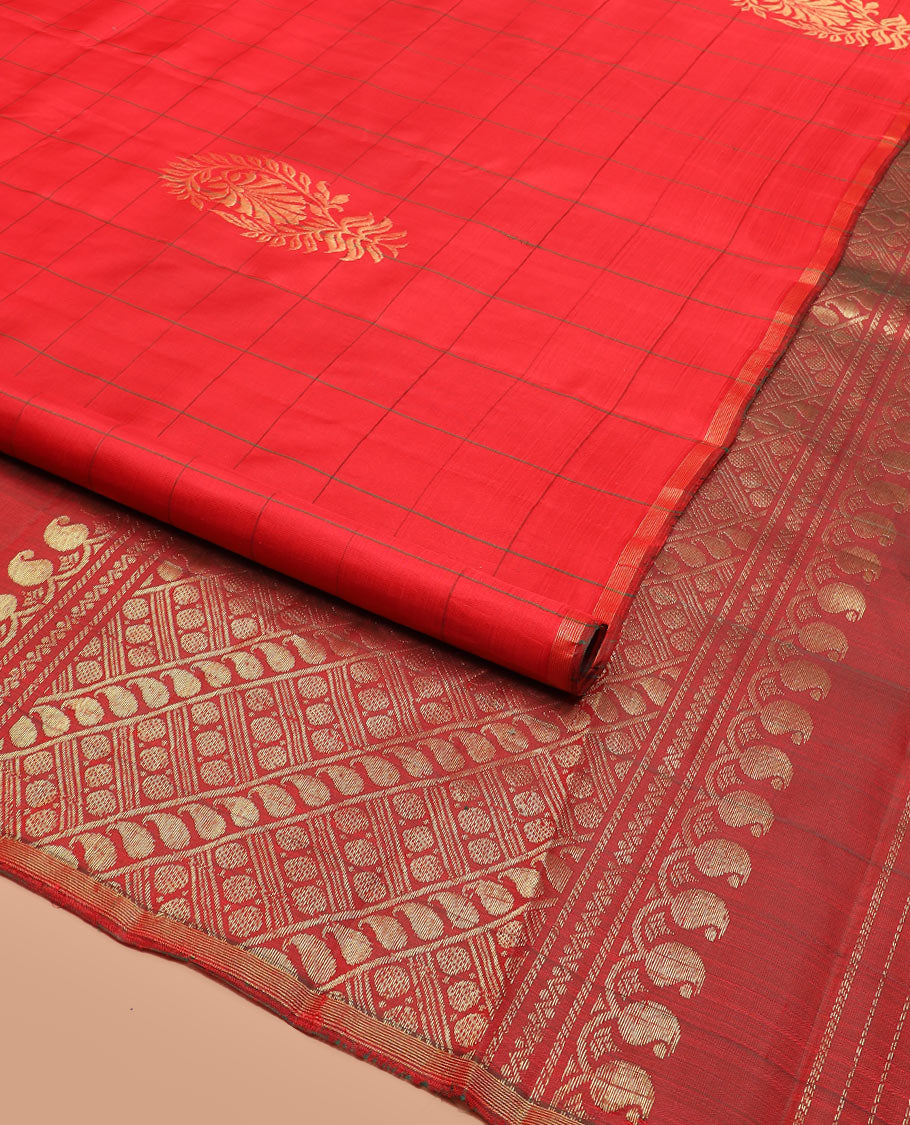 Red Kanchipuram Silk Saree Embellished with Big Floral Buttas within Checks, Complemented by a Piping Border, Featuring a Contrast Pallu Steeped with Manga Motifs, Paired with a Matching Blouse