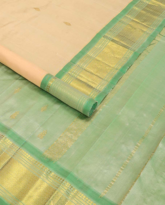 Cream buttas kancheepuram silk saree with contrast border of rekku, muthu, banaras, geometric design & floral buttas pallu