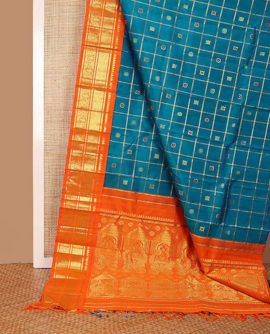 Blue zari buttas enclosed, checked kanchipuram silk saree, contrast one-sided korvai border of thilakam mokku,banaras,jaal & manga & intricate pallu