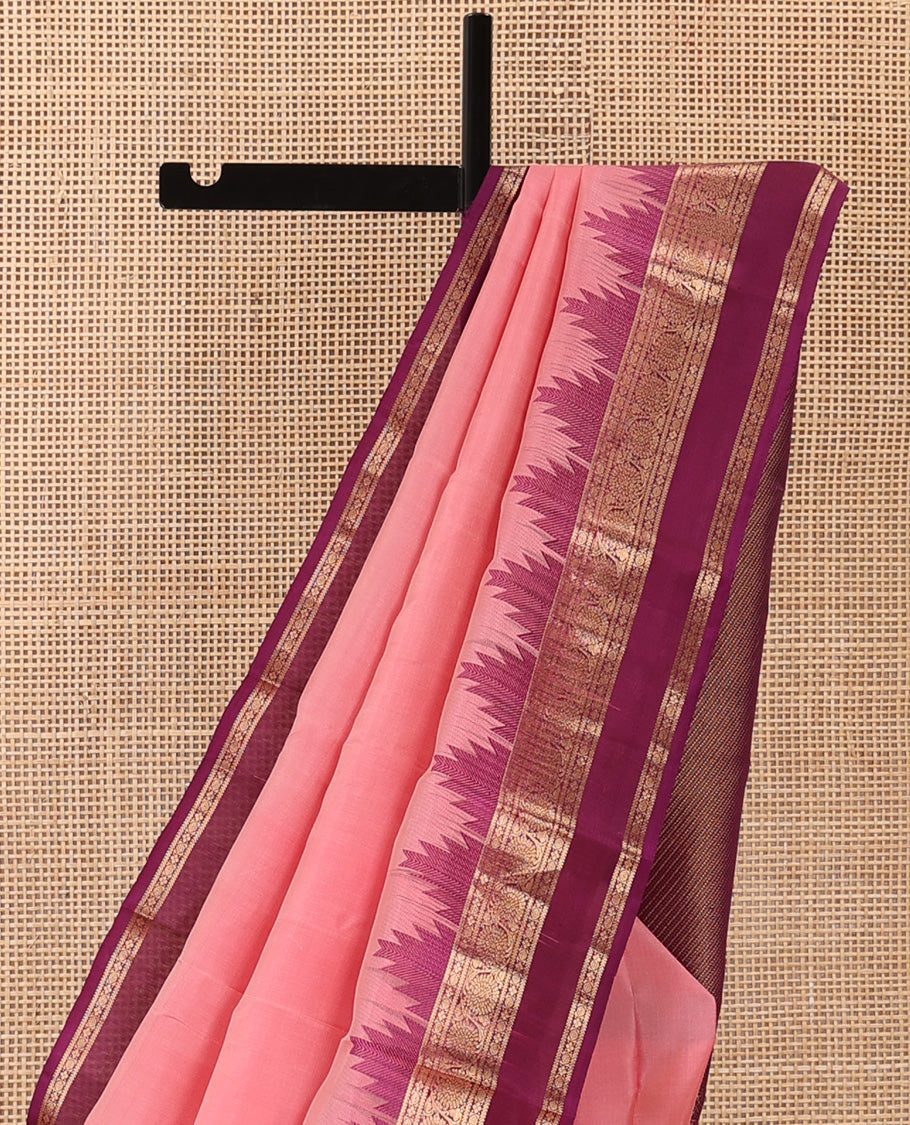 Pink plain Kanchipuram silk saree, contrast rettai pettu border border of kodi visiry designs, and diagonally woven pallu