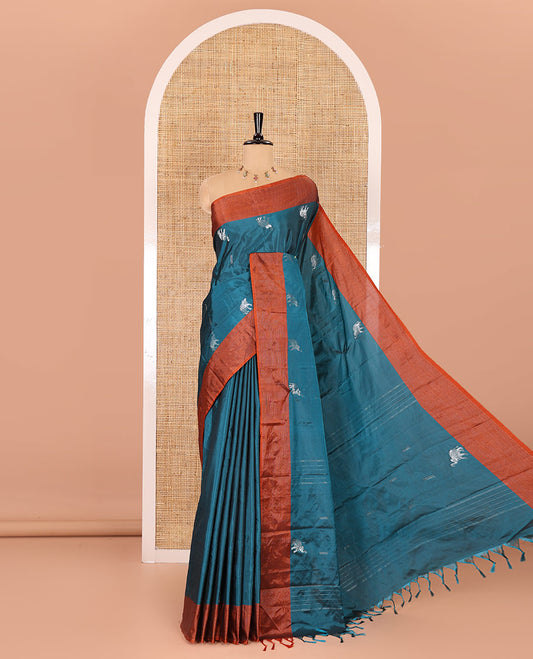 Blue dobby and elephant buttas semi-soft silk saree, contrast zari striped border, zari design pallu, and a matching blouse
