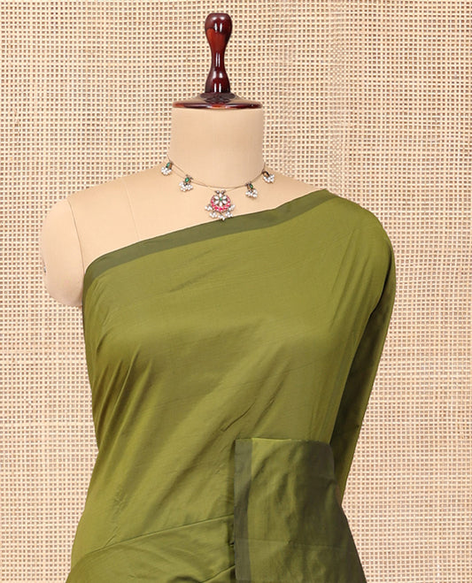 Borderless Green Leaf Buttas Arani Saree, a Contrast Pallu of Zari Stripes and Buttas, and a Contrast Blouse