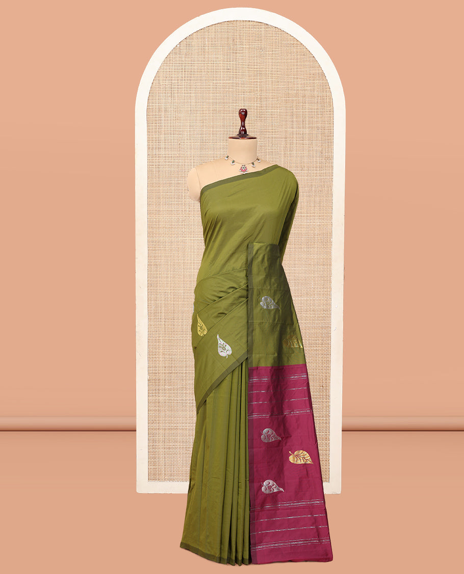 Borderless Green Leaf Buttas Arani Saree, a Contrast Pallu of Zari Stripes and Buttas, and a Contrast Blouse