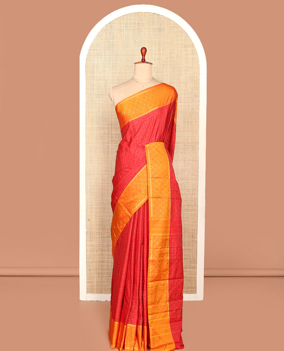 Red Aarani Silk Saree, Elevated with Butta Enclosed Checks, Complemented by a Contrast Butta Enclosed Checked Border, Zari Design Pallu, and Paired with a Matching Blouse