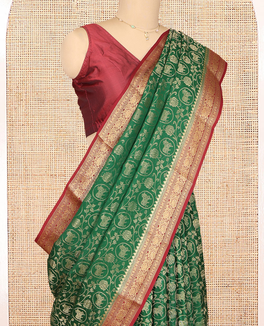 Green Mysore Silk Saree, Embellished with Lotus Vine and Pichwai Cow Designs, Complemented by a Contrast Traditional Zari Border, Grand Pallu, and a Contrast Blouse