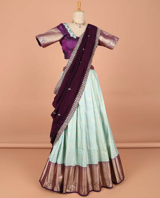 Blue floral jacquard semi-stitched half saree with contrast zari border,  embroidered blouse & scallop border dhavani
