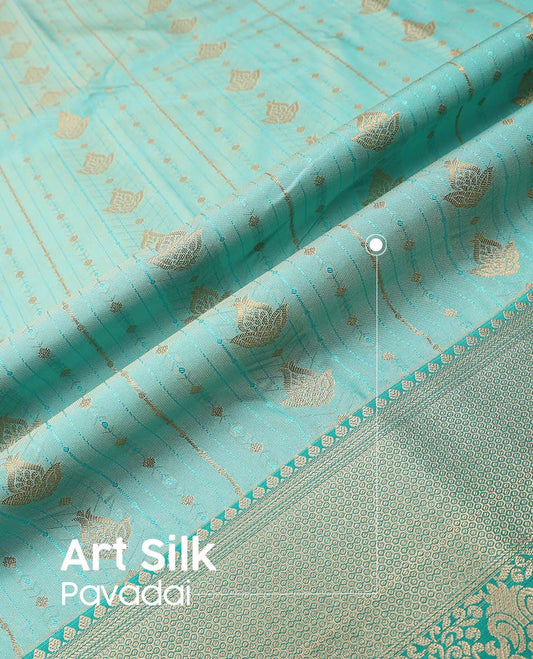 Turquoise art silk pavadai material, zari design with embossed contrast traditional zari border skirt, and contrast blouse